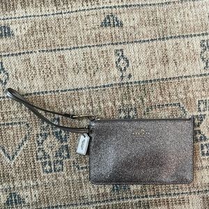 Glitter coach wristlet